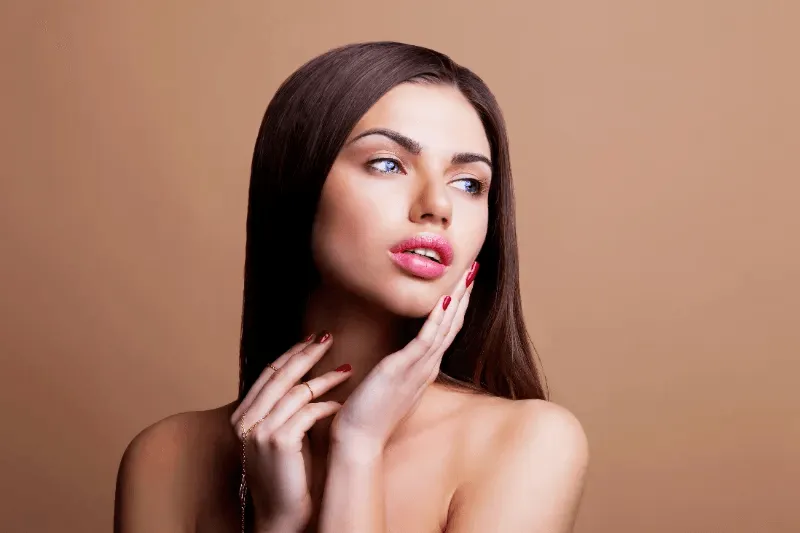 The image illustrates the aesthetic enhancement achieved through the permanent lip tint procedure.
